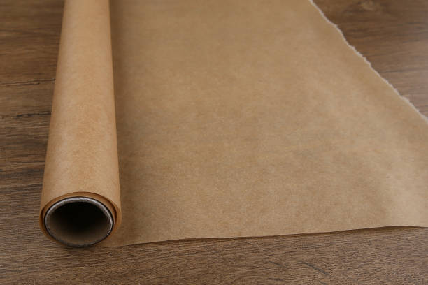 istock Baking paper on wooden background. 680650832