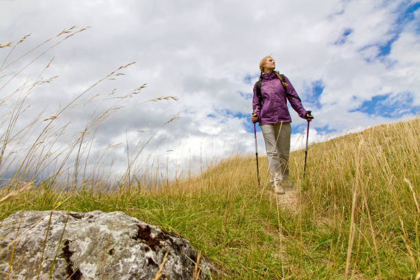 istock Young woman hiking in nature 680658144