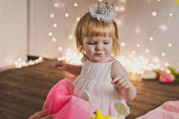 istock Little Princess eating her first cake 5385. 680660326