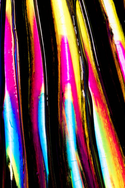 istock Neon Pink, Blue and Yellow Wet Paint Abstract Background 680664012