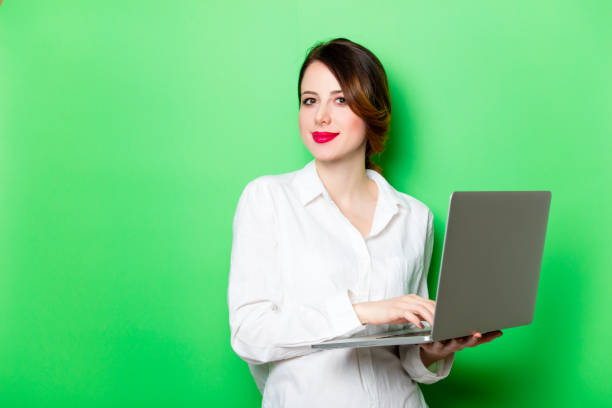 istock young woman with laptop 680665110