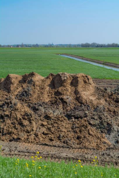 istock Earth heap high-water channel digging flood canal 680669018