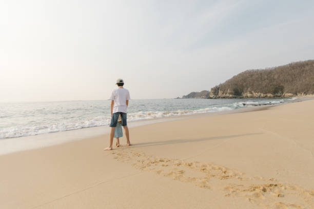istock Brother And Sister At The Beach 680669534