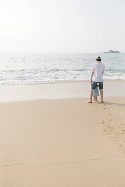 istock Brother And Sister At The Beach 680669542