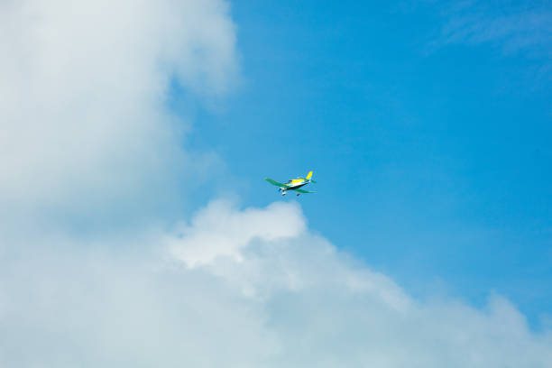 photo of beautiful colorful airplane on the wonderful blue clear sky background