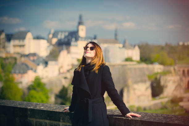young woman enjoying the view at Luxembourg stock photo