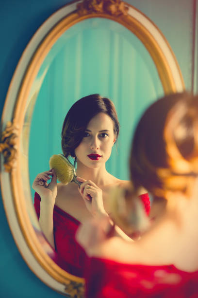 istock young woman with comb 680675758