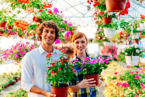istock Buying fresh and potted flowers for interior 680681098