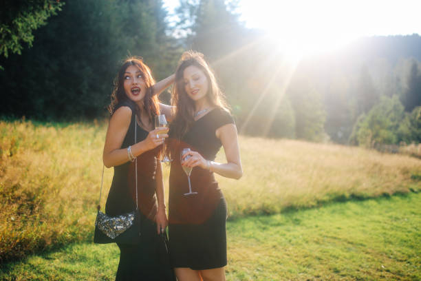 istock Bridesmaids celebrating in the nature 680687784