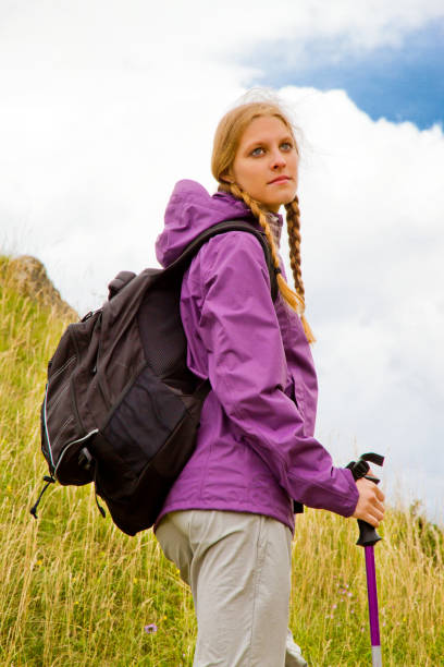 istock Young woman hiking in nature 680693630