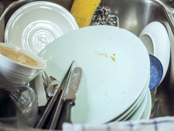 istock Dishes in the sink 680694734