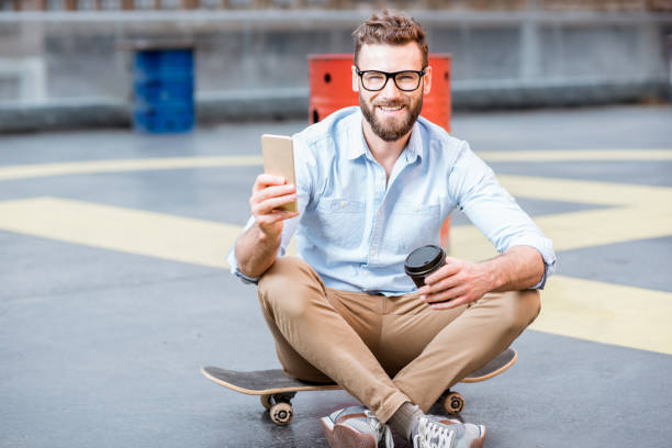 istock Businessman with smart phone on the rooftop 680710334