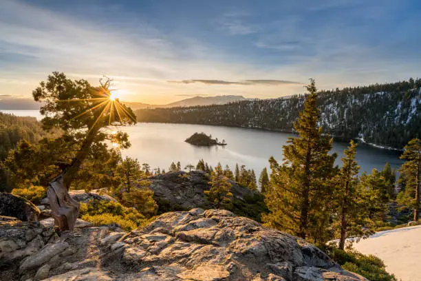 Sunrise at Emerald Bay on Lake Tahoe between California and Nevada with snow covered Sierra Nevada Mountains