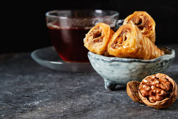 istock Traditional eastern arabic dessert Baklava with Turkish honey and walnuts, selective focus. Copy space. 680710956