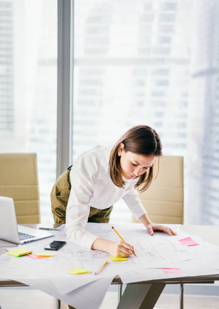 istock Young woman working at the office 680711084