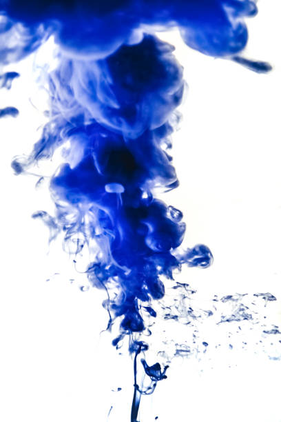 istock blue ink in water isolated on white background 680717152