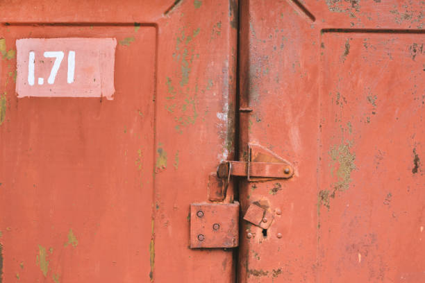 istock The old door locked on shutter. Set of backgrounds 680720432