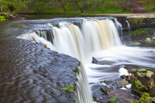 istock Keila Joa waterfall, long exposure and spring time with greenery. 680720774