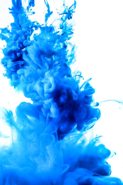 istock blue ink in water isolated on white background 680730416
