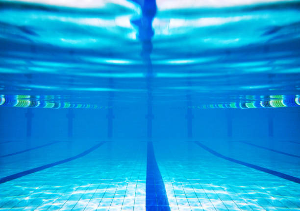 swimming pool underwater stock photo