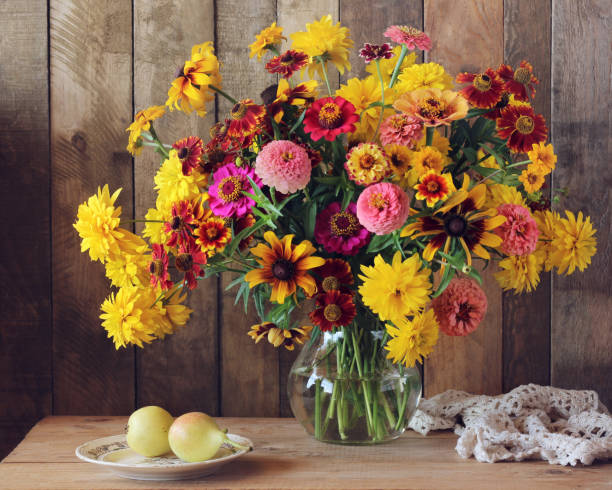 istock Still life with flowers and pears. 680747088