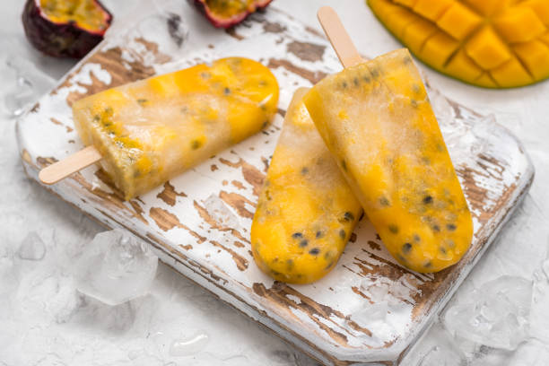 istock Homemade frozen popsicles with fresh mango and passion fruit 680758204