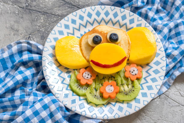Funny monkey pancakes for kids breakfast