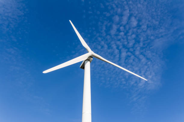 istock Wind turbine in front of a blue sky 680761744