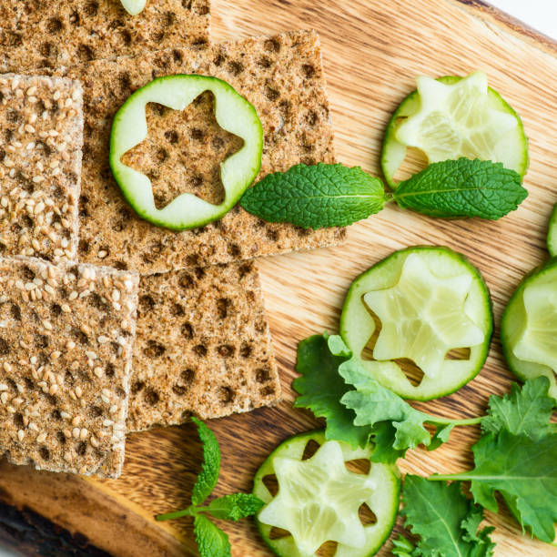 istock Snack from Wholegrain Rye Crispbread Crackers and Cucumber 680766492
