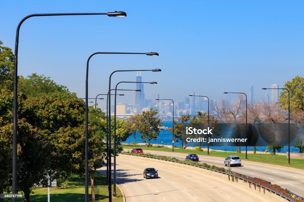 Lakeshore Drive Chicago Chicago skyline seen from Lakeshore Drive in the South Side of Chicago, IL, USA. Driving Stock Photo
