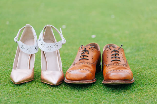 istock Bride and groom shoes 680775648