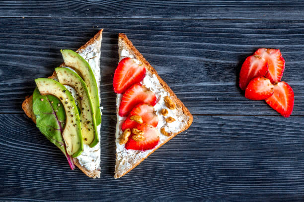 istock sandwiches set on dark table background top view 680784700