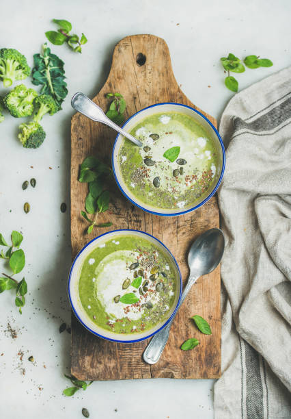 istock Spring vegetarian broccoli cream soup with mint and coconut cream 680789536