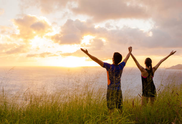 istock Couple enjoying sunshine in the wheat field 680795412