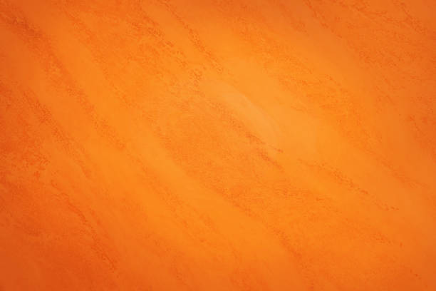 Old grunge orange wall texture Old grunge orange wall texture at the edge of burnt frame grunge stock pictures, royalty-free photos & images
