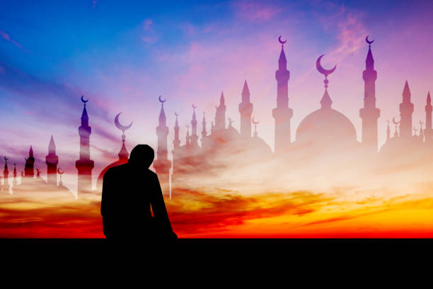 istock Islamic man praying Muslim Prayer in Twilight time 680796266
