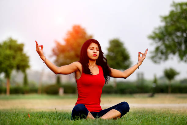 Yoga ! Young women doing meditation in the nature. handspring stock pictures, royalty-free photos & images