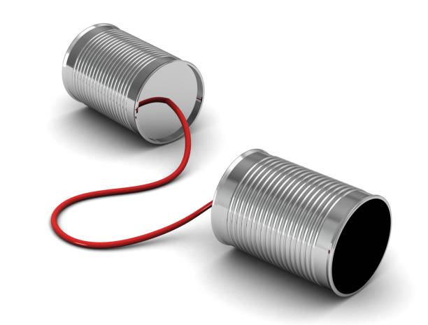 istock Tin can telephone with cord on grey, telephony concept.3d render. 680812642