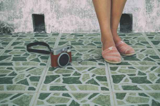istock Hipster girl with retro camera. 680815328