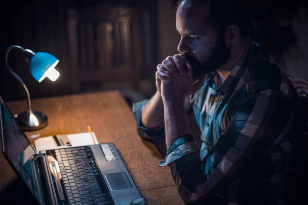 istock Young bearded man checking his bank account online 680819104