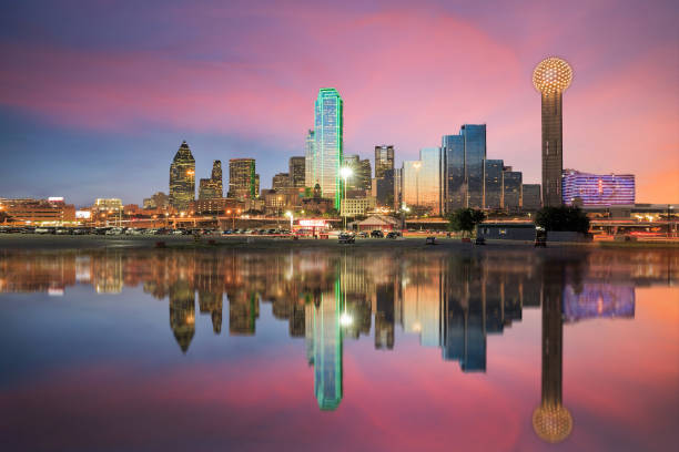 Dallas skyline reflected in Trinity river at sunset Dallas skyline reflected in Trinity river at sunset, Texas reunion tower photos stock pictures, royalty-free photos & images
