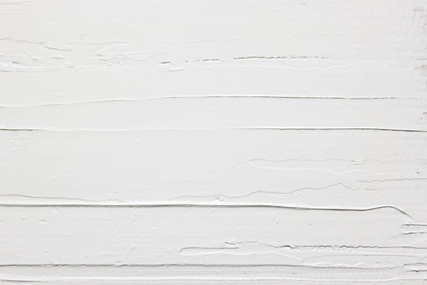 istock White background of plaster wall texture, closeup 680830098