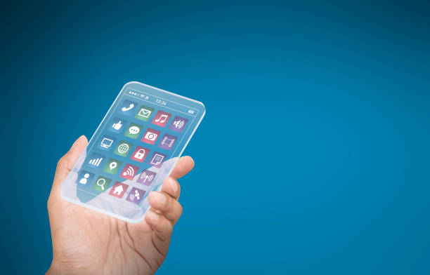 istock hand holds futuristic transparent smart phone 680847216