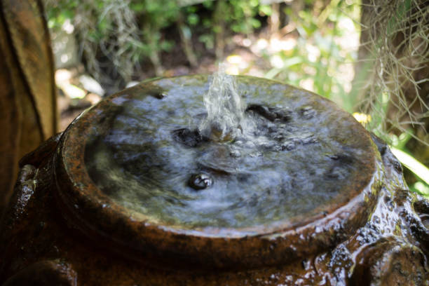 istock Home Garden Decorated With Vintage Fountain 680850064