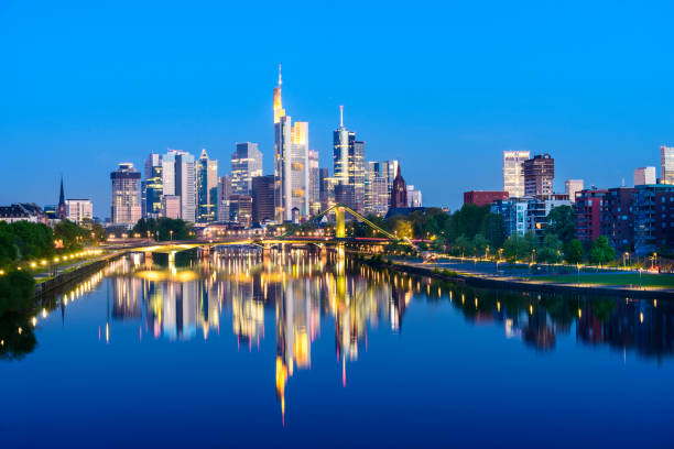 istock Frankfurt City skyline and Main river reflection at twilight, Germany 680850624
