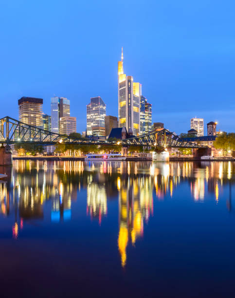 istock Frankfurt City skyline and Main river reflection at twilight, Germany 680850716