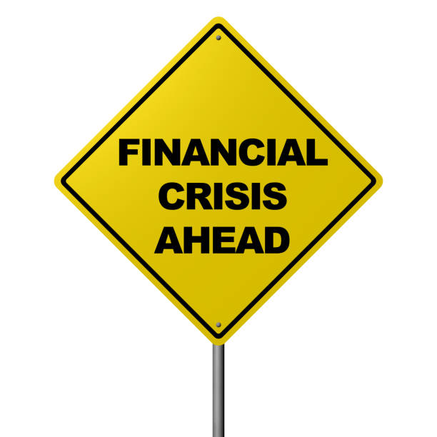 istock Financial Crisis Ahead - Road Warning Sign 680860034