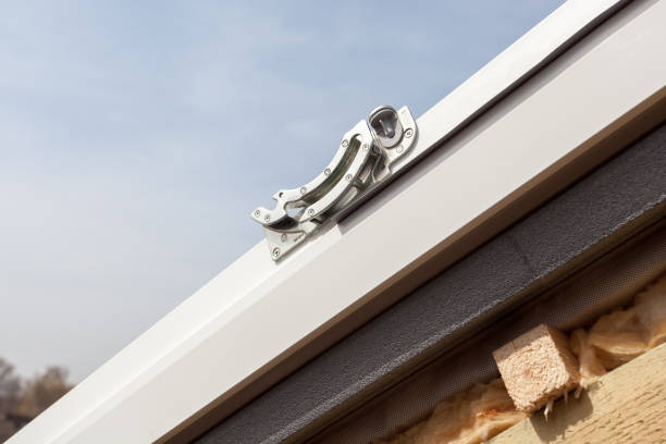 istock Closeup of element in plastic (mansard) or skylight window on a asphalt shingle roof 680865892