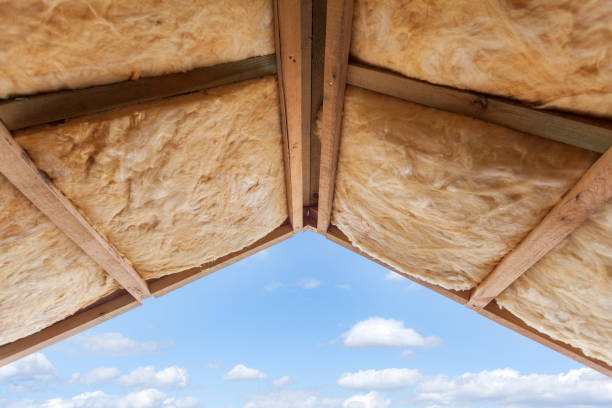 istock Fibreglass insulation installed in the sloping ceiling of a new frame house. 680865928