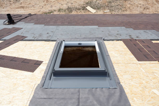 istock Installing window skylight on a roof with Asphalt Shingles or Bitumen Tiles under construction 680865960